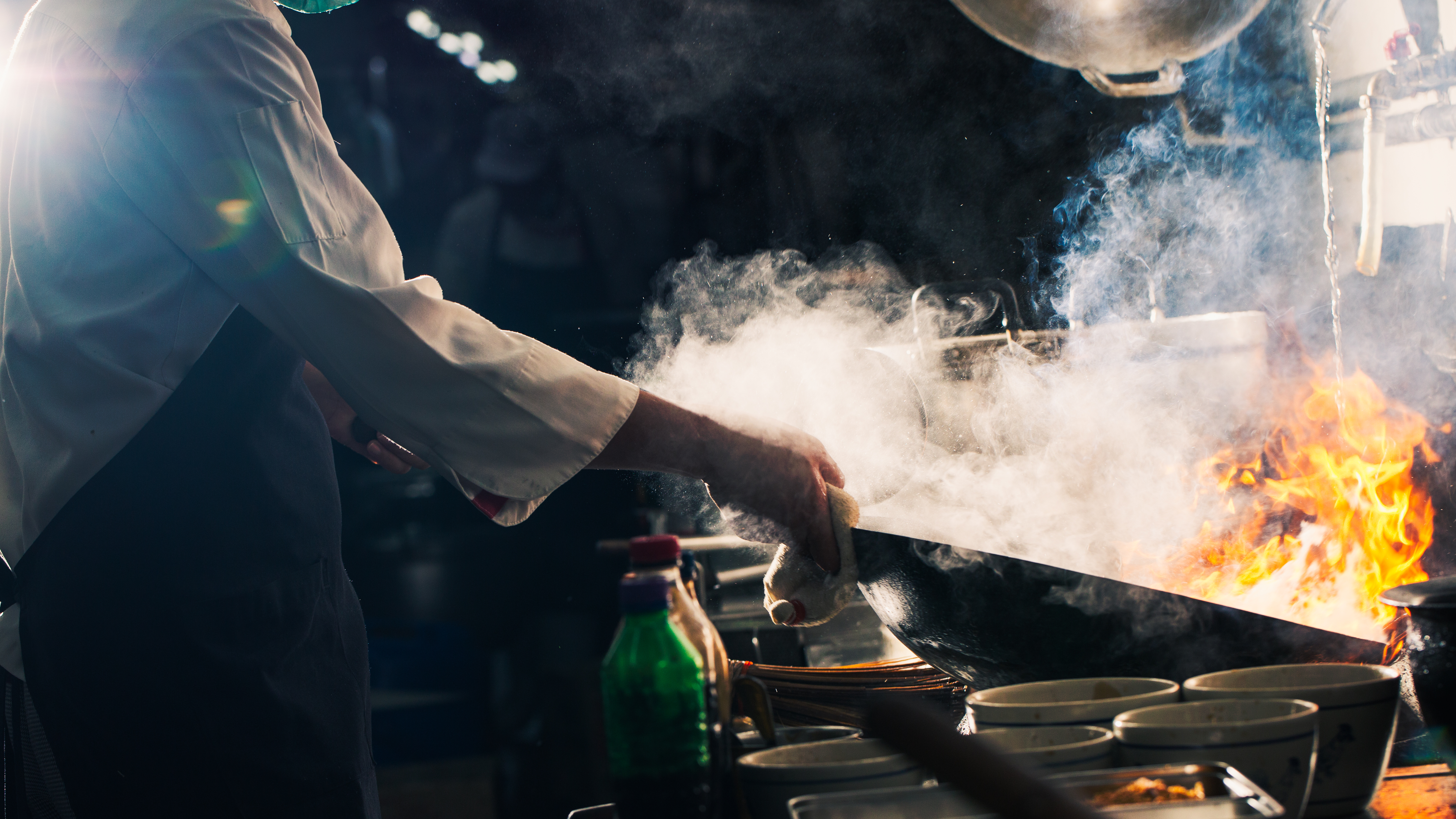 35874060_chef-stir-fry-in-wok